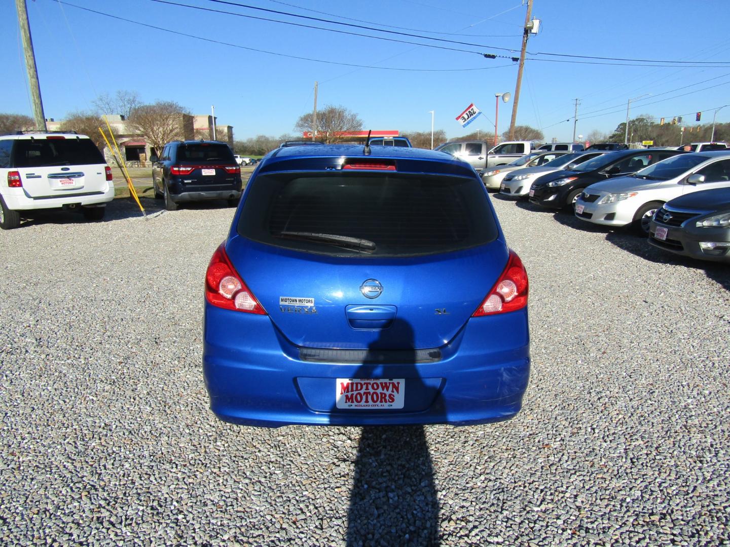 2012 Blue /Black Nissan Versa 1.8 SL Hatchback (3N1BC1CP4CK) with an 1.8L L4 DOHC 16V engine, Automatic transmission, located at 15016 S Hwy 231, Midland City, AL, 36350, (334) 983-3001, 31.306210, -85.495277 - Photo#6